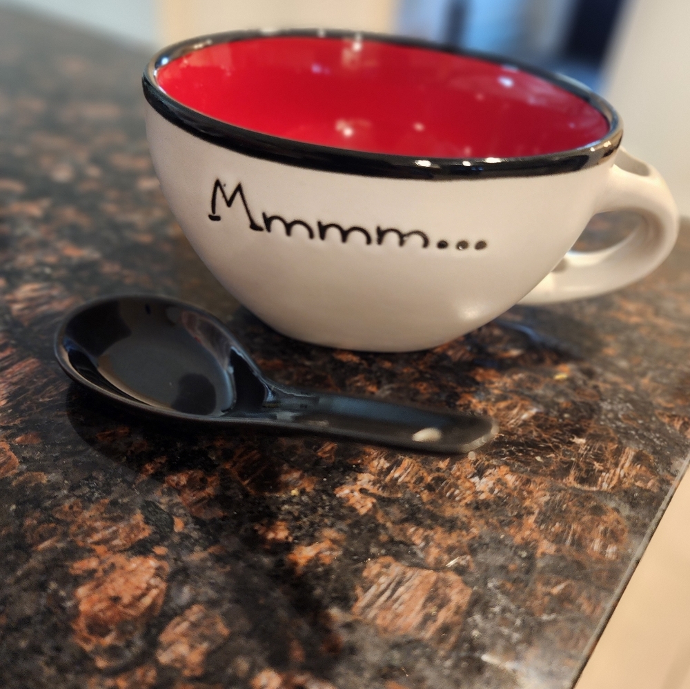 A cute ceramic soup bowl that comes with their own soup spoon .